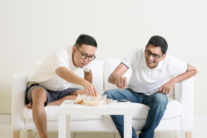 men talking and laughing: SBDMedical Men’s Health Article
